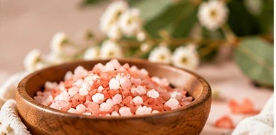 Pink mineral salt in a wooden bowl
